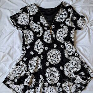 Black and white flare crochet top Suzy Shier Small. Never been worn.